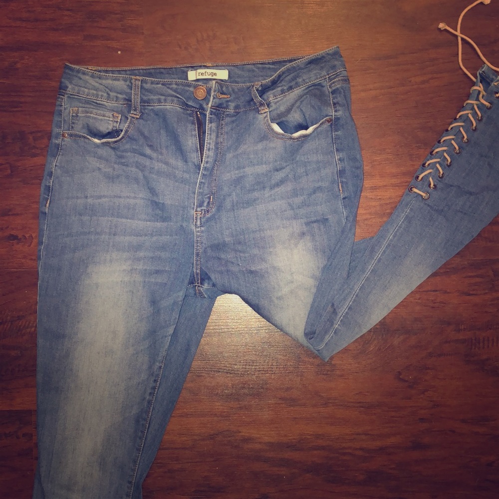 Light denim skinny jeans with tie up the bottom